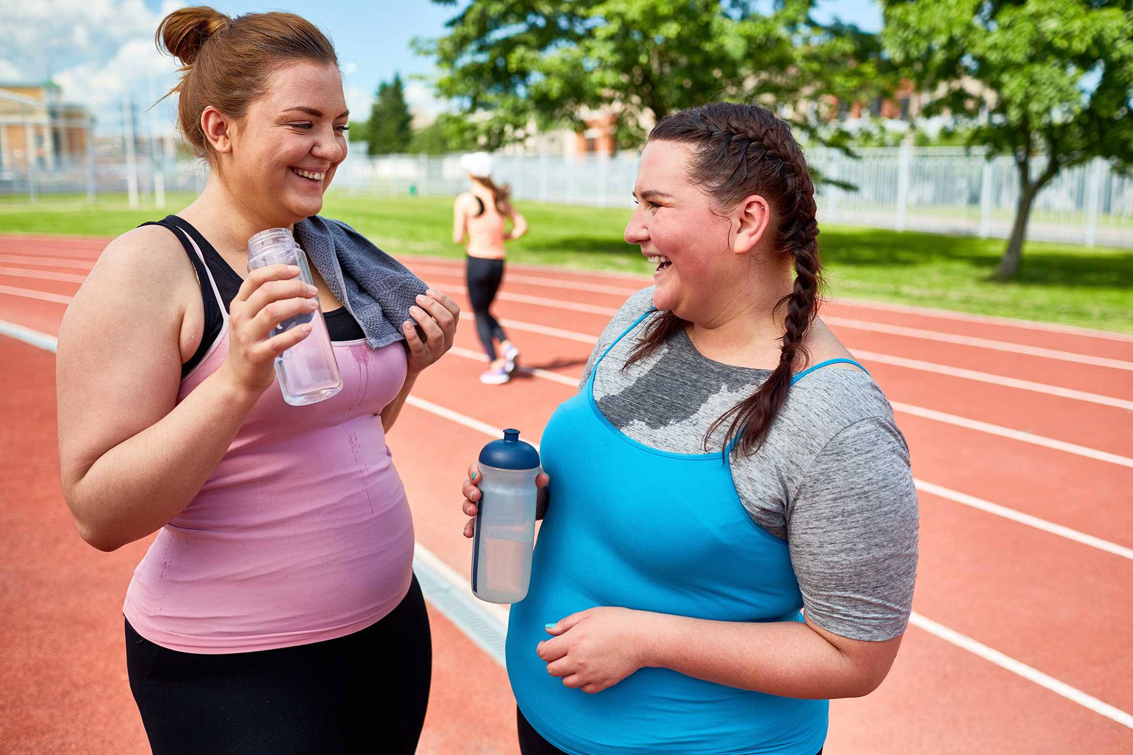 How might fat distribution in the body influence cancer risk?